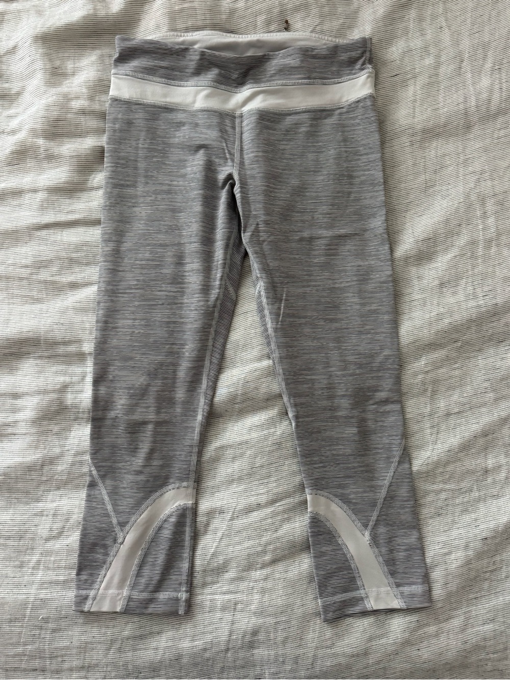 Lululemon Capri legging. White w dark grey streak stripes. Size 6.